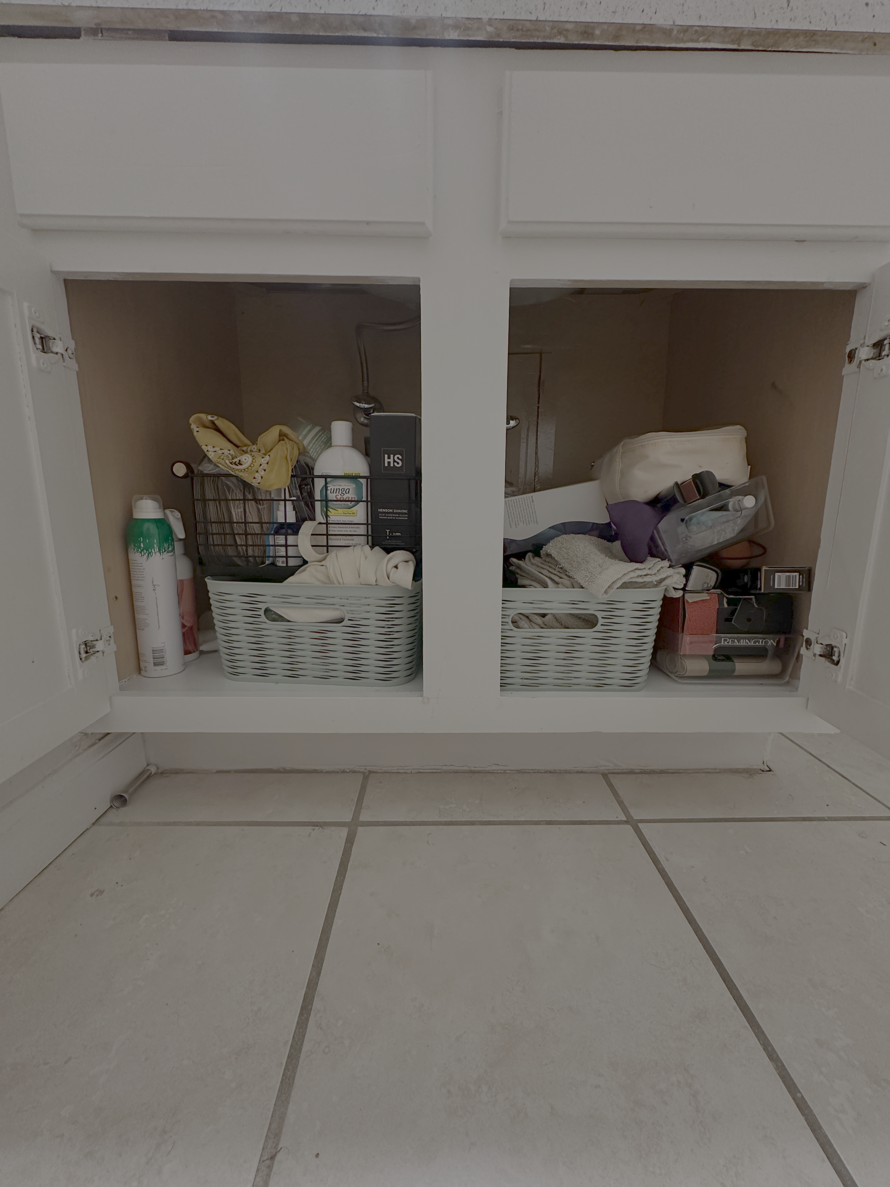 Under-sink cupboard before organizing