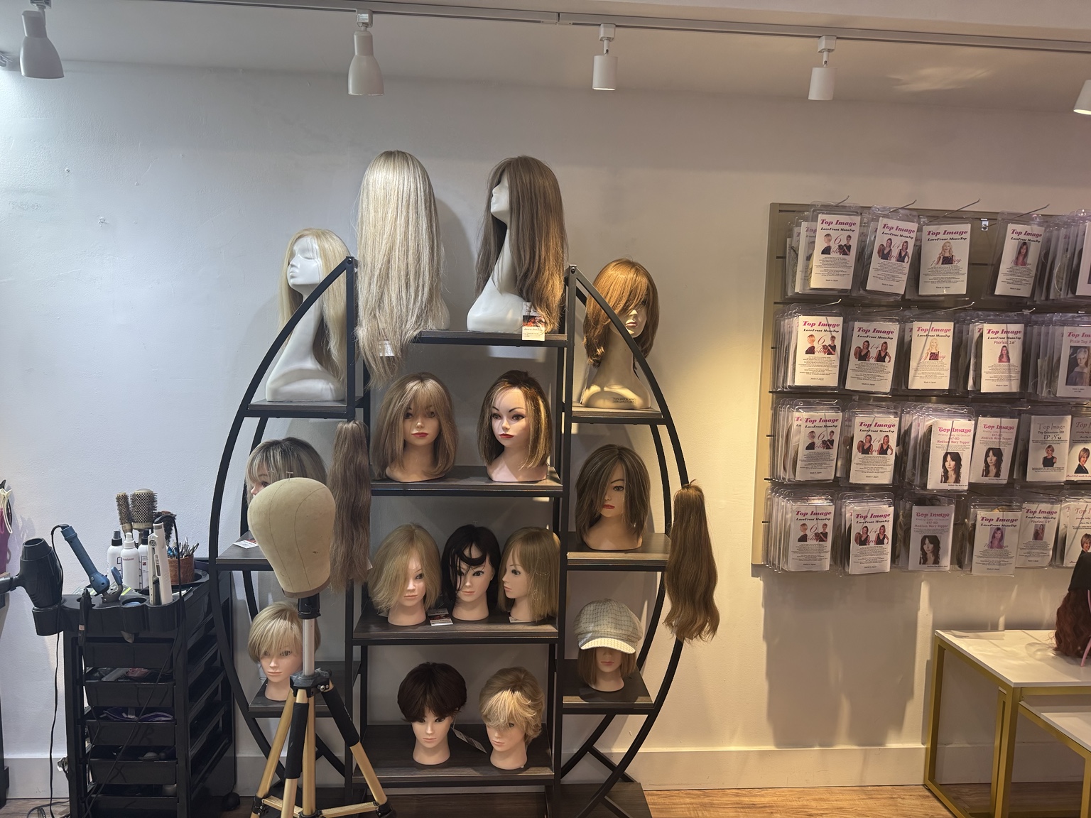 Hairpiece and wig display inside Wigs by Jolie