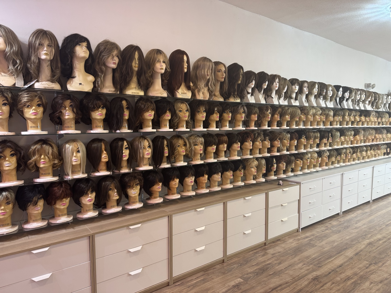 Wide interior view of Wigs by Jolie