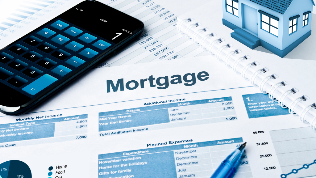 A close-up of mortgage planning documents featuring a calculator, financial worksheets, a notebook, a miniature house, and budgeting figures. The image represents real estate financing, mortgage preparation, investment analysis, and financial planning for property buyers. It supports topics such as multifamily investing, commercial real estate, interest rates, cash flow analysis, lending strategies, investment budgeting, and the 2026 market outlook for multifamily and commercial property in Albany NY. A close-up of mortgage planning documents featuring a calculator, financial worksheets, a notebook, a miniature house, and budgeting figures. The image represents real estate financing, mortgage preparation, investment analysis, and financial planning for property buyers. It supports topics such as multifamily investing, commercial real estate, interest rates, cash flow analysis, lending strategies, investment budgeting, and the 2026 market outlook for multifamily and commercial property in Albany NY.
