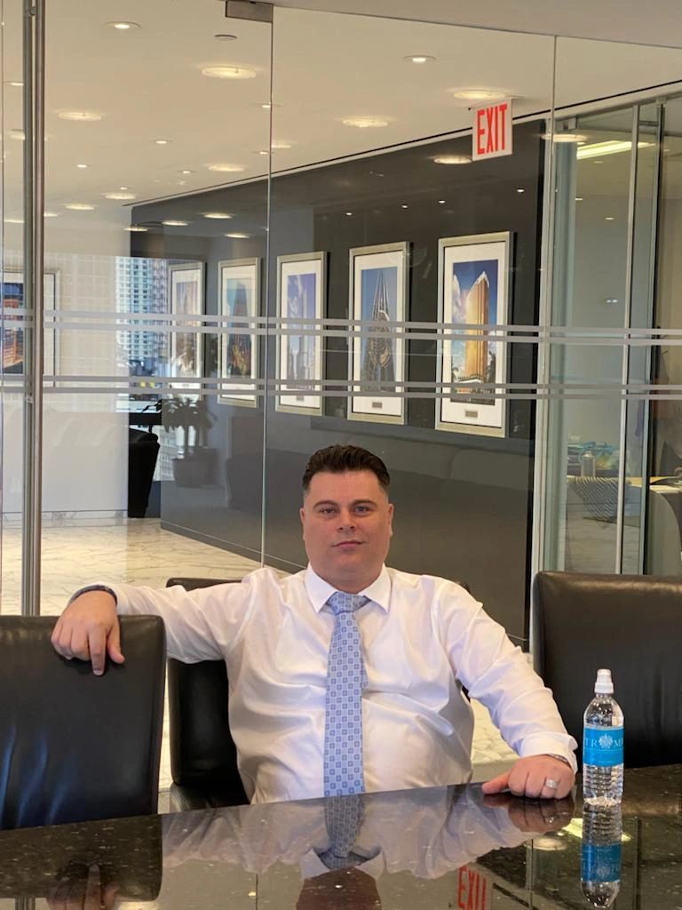 Peter Risko seated in his office