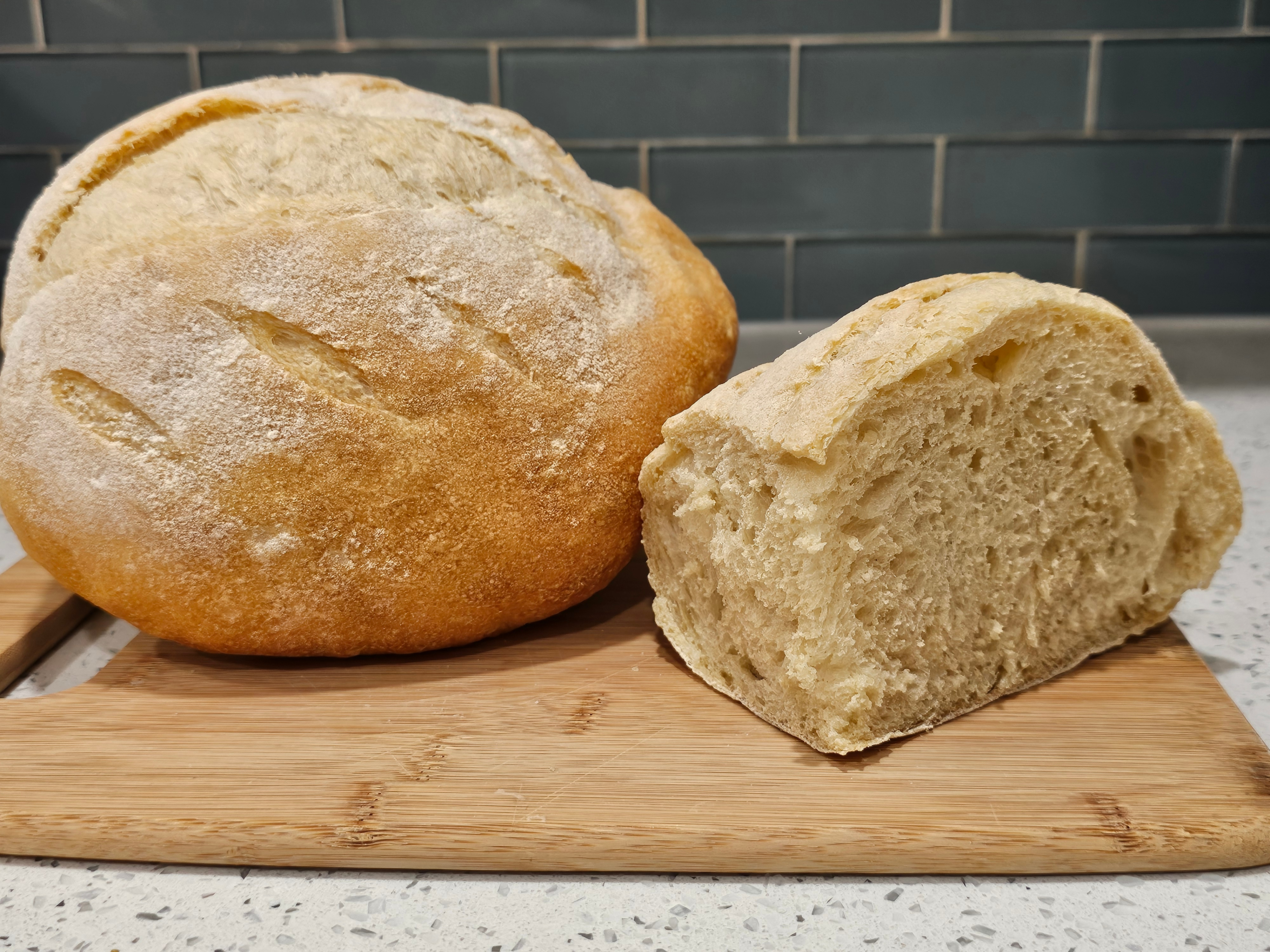 Rustic sourdough bread loaf with a golden crust