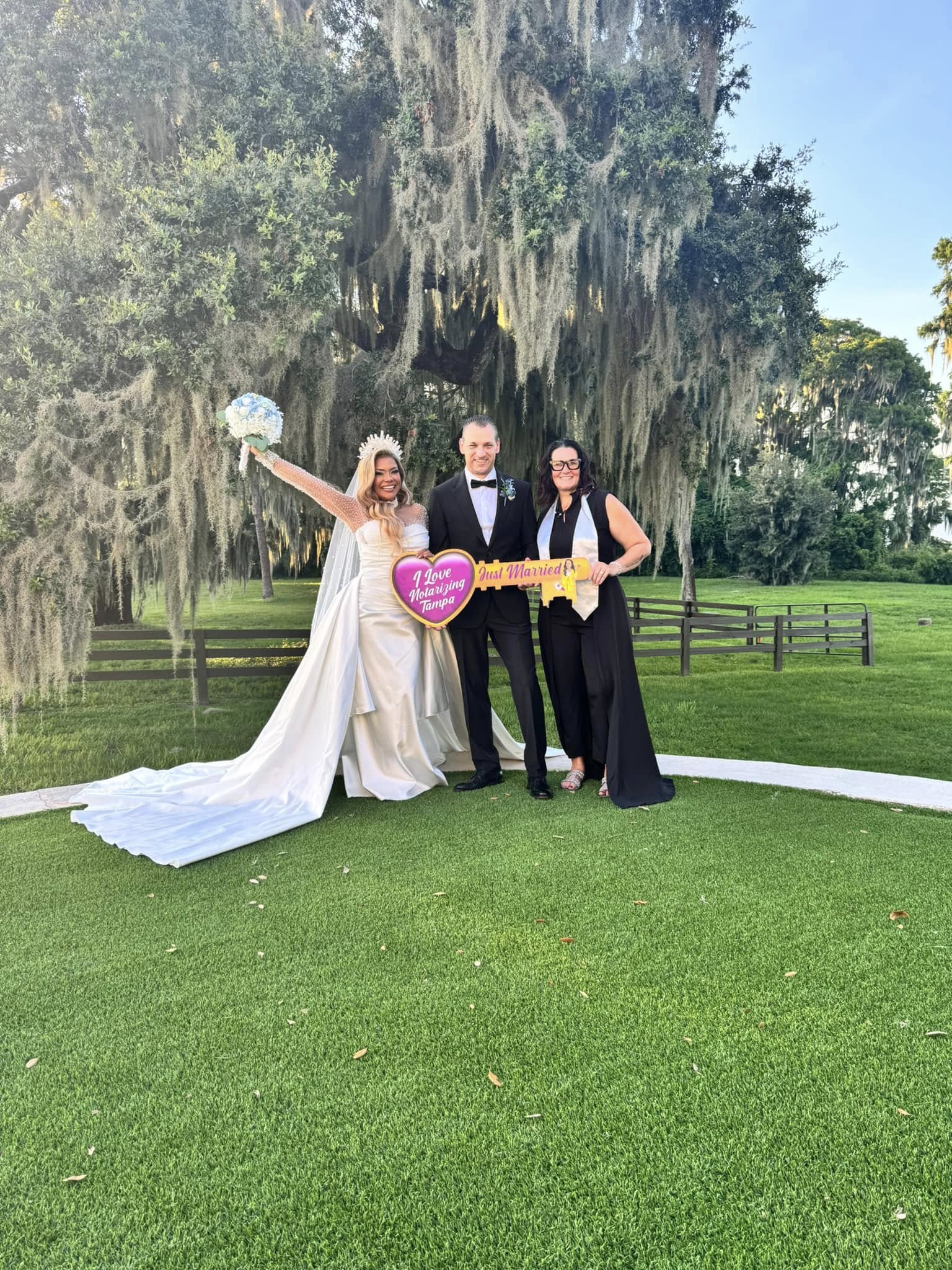 Melissa Battle Saunders with a couple, Notarizing Tampa