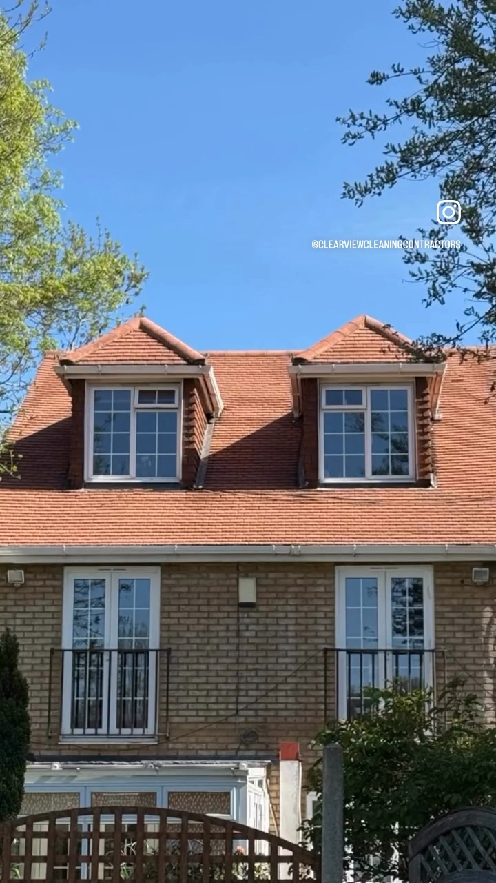 A roof, driveway and patio clean on a house, from start to finish