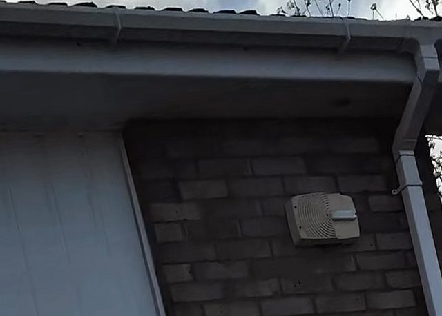 After: the same corner, with the gutter clean and white