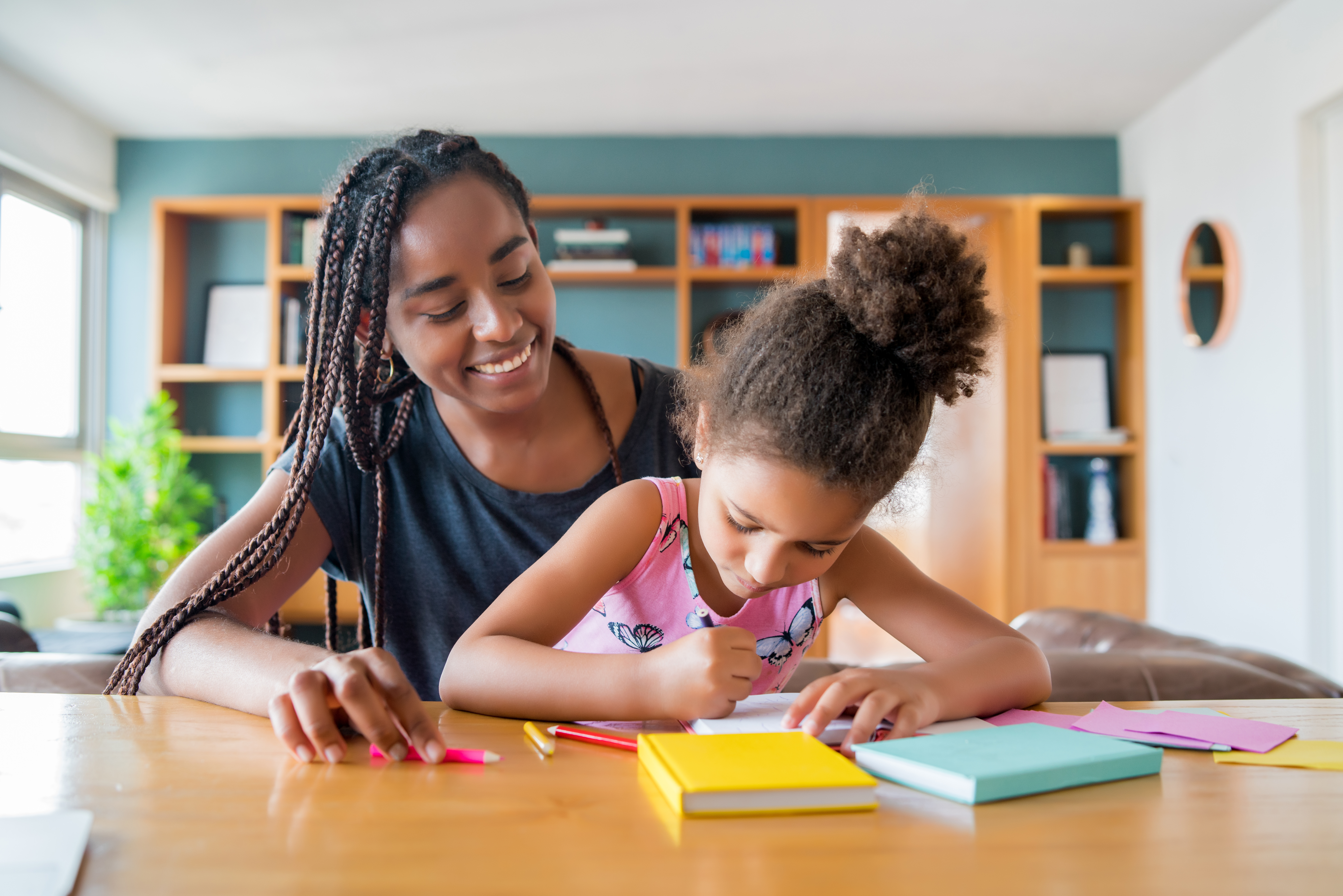 Mother and daughter homeschooling