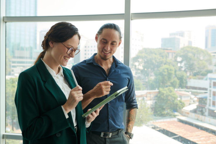 two colleagues discussing with each other