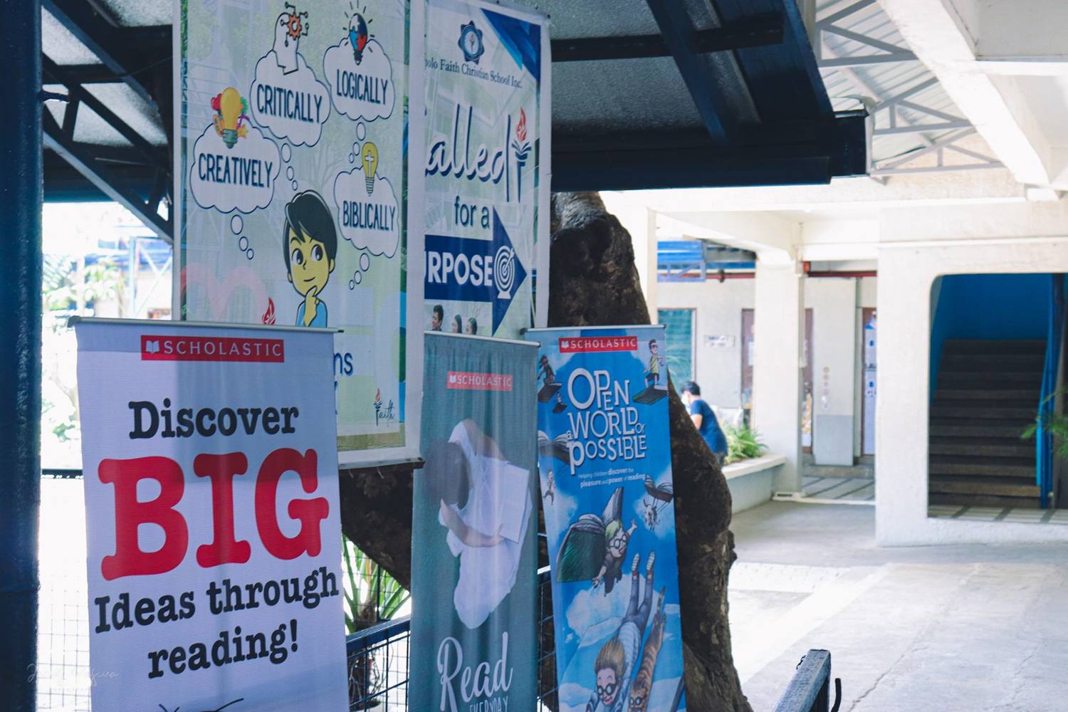 Reading banners in a school hallway