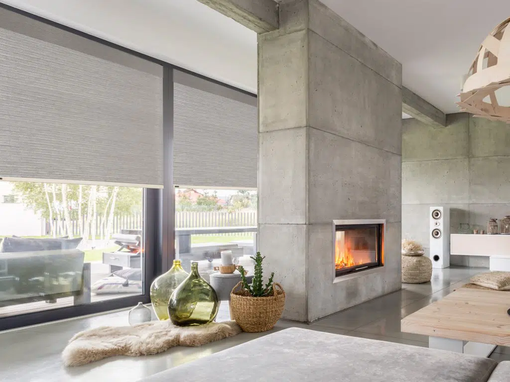 Custom roller shades in a bright living space