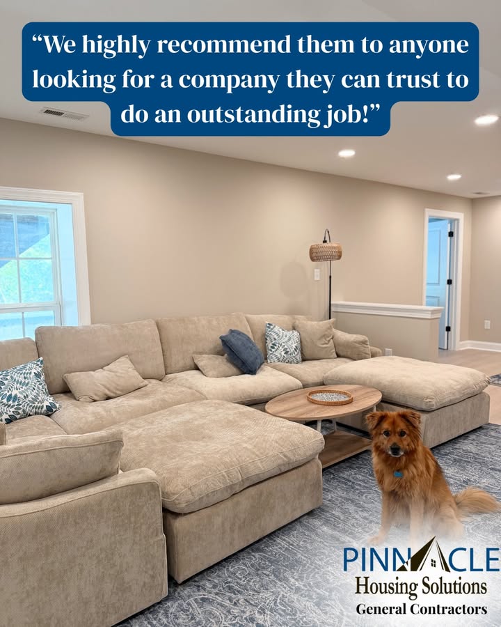 Finished basement lounge with a large sectional sofa, recessed lighting and a window in Chester County, PA.
