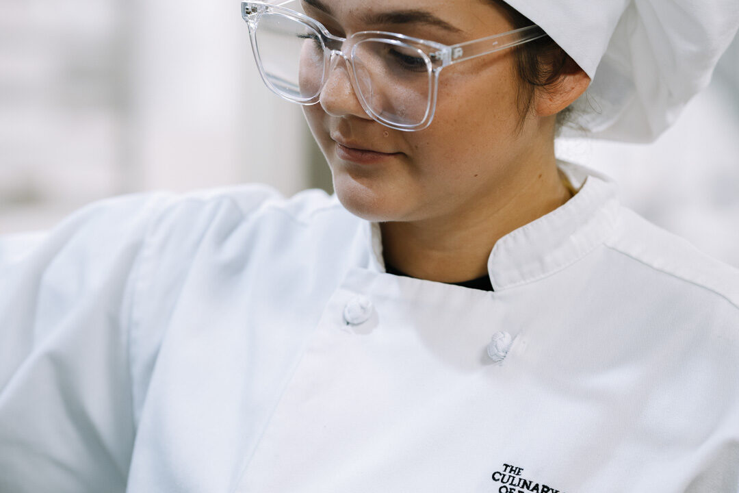  cohort" imageCulinary students working in a professional kitchen at CSFTW