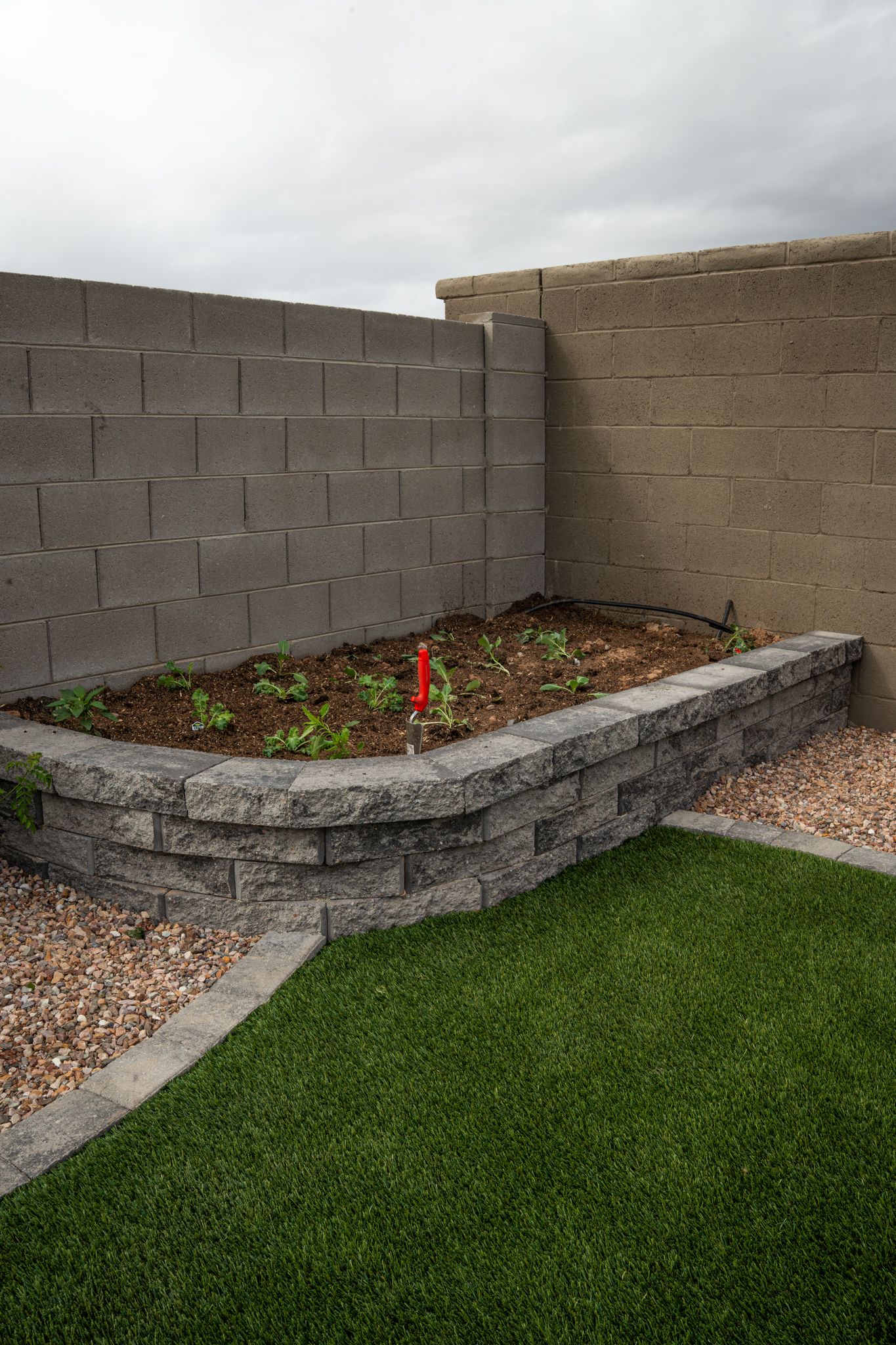 Beautiful Hardscape Add-On Planter with Turf and Paver Project
