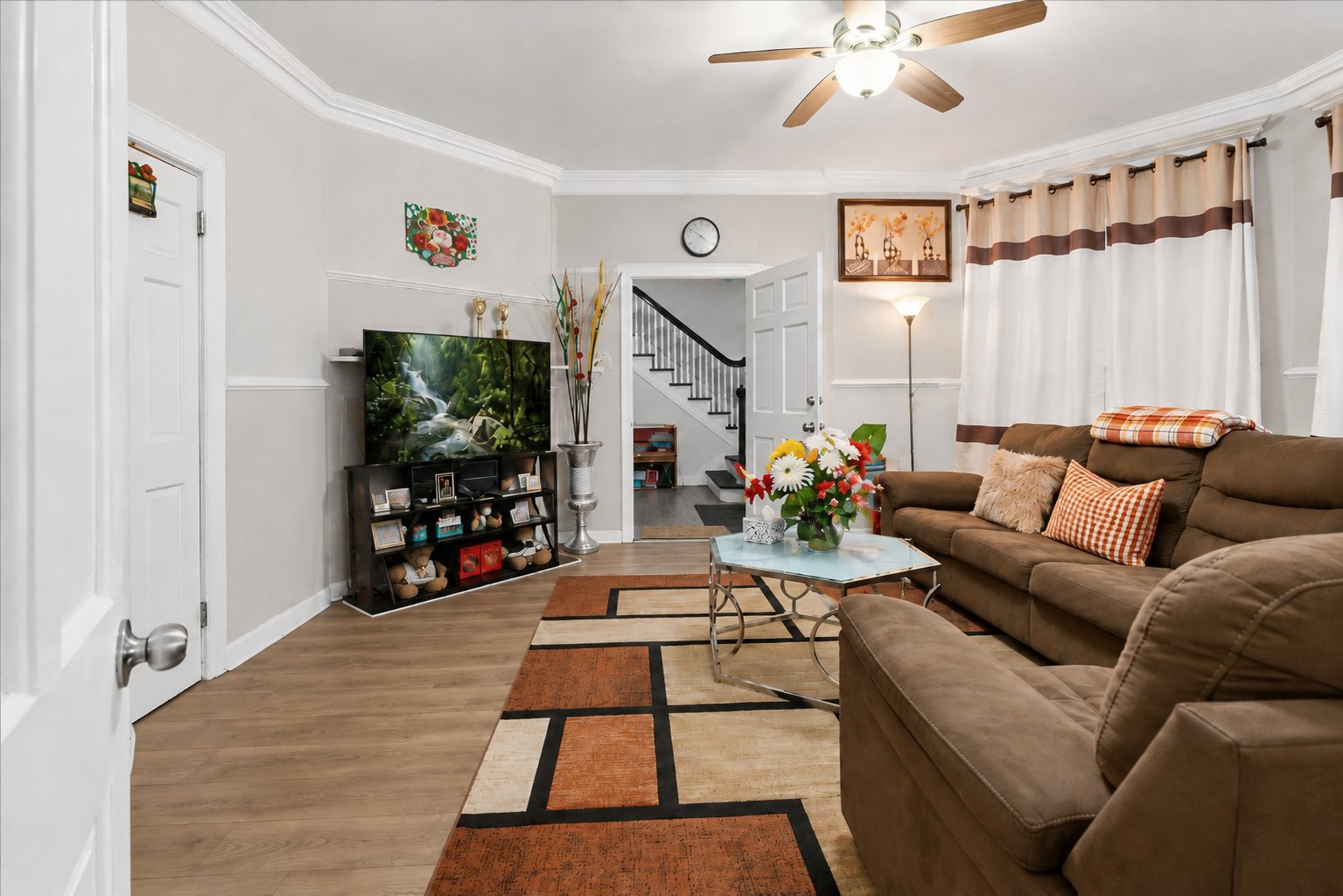 Staged living room of the first-floor residence at 124 Union Avenue, Mount Vernon