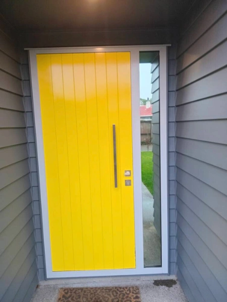 Frameless glass side panels installed around front doorway in Wairarapa home