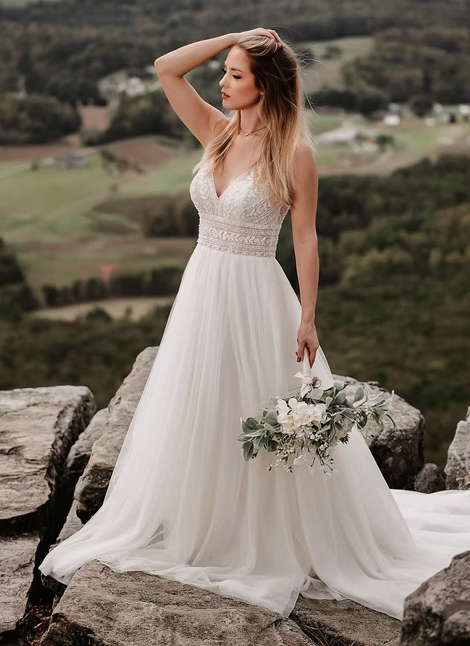 Bride Standing on Rocks