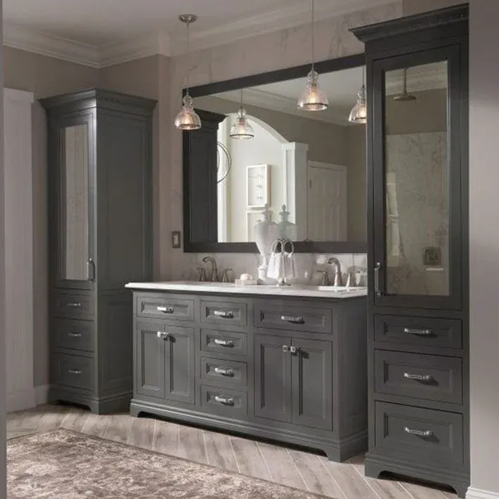 Gray bathroom vanity with framed mirrors