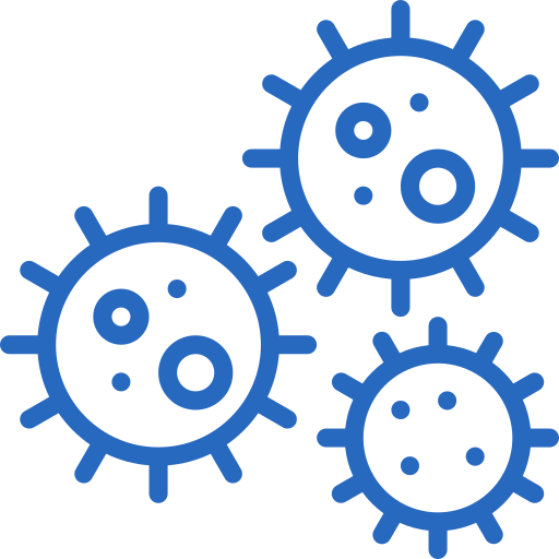 A man in a yellow cap and white shirt assembling furniture on the floor, holding a wrench.