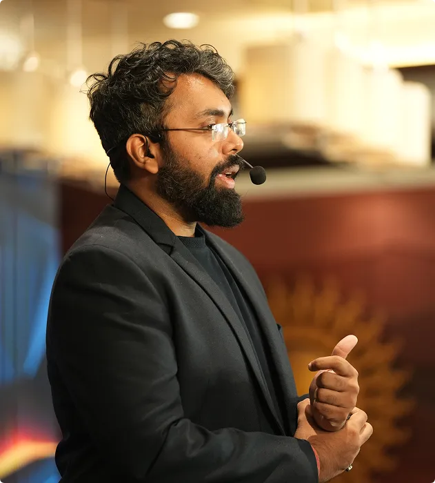 Chirag Jhumkhawala speaking on stage