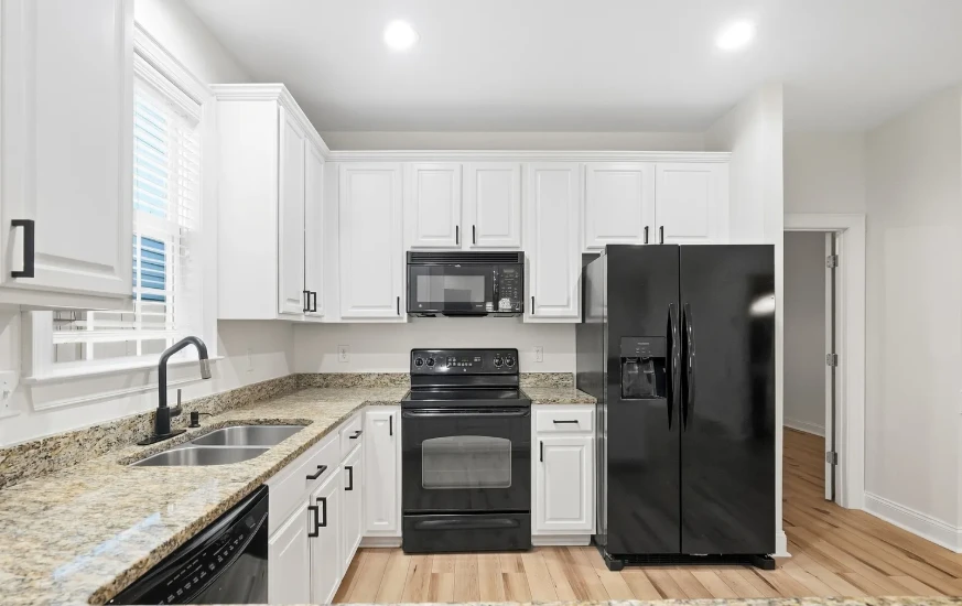 Bright renovated kitchen by Nuvo Holdings