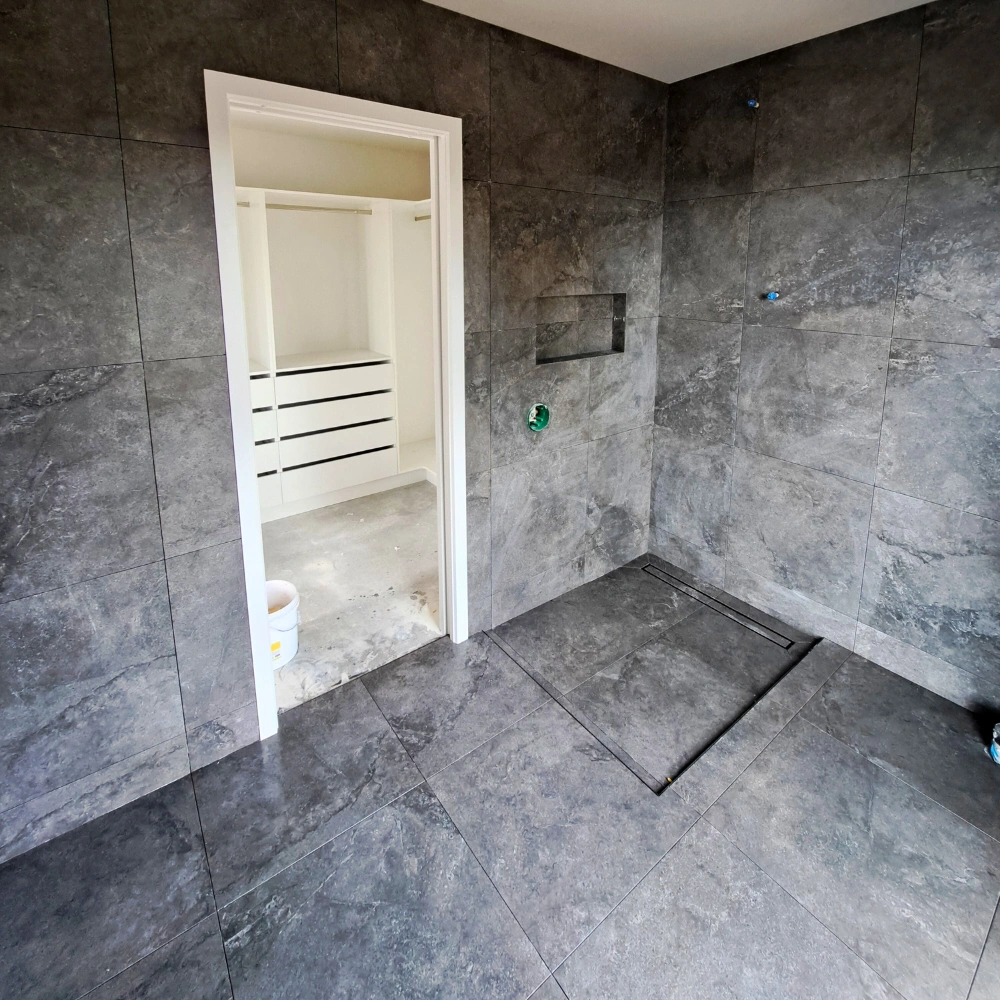 FS Tiling team installing premium bathroom tiles in Kerikeri, Northland