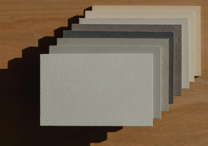 Microcement colour samples showing texture and tone variations