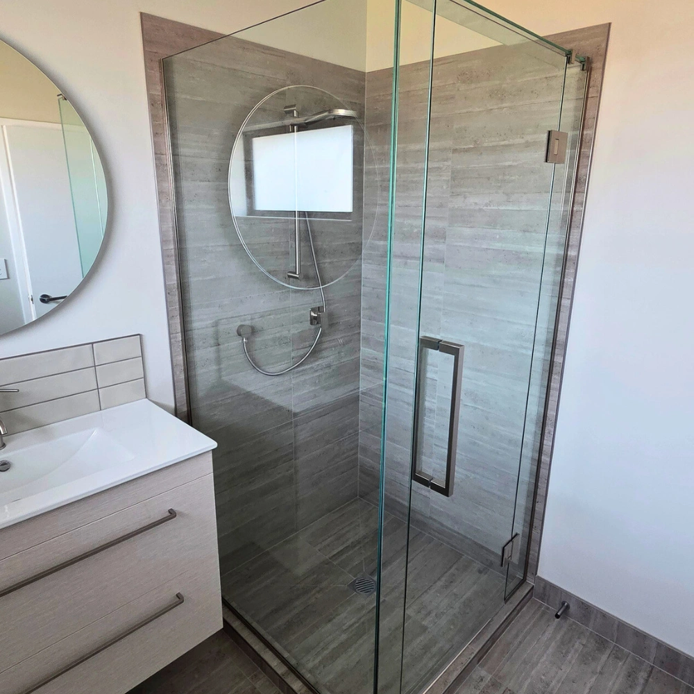 Shower and bathroom floor tiling in Kerikeri with large format tiles and waterproofed base