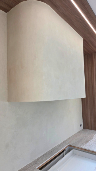 Microcement kitchen splashback and rangehood in Kerikeri with seamless modern finish by FS Tiling Northland