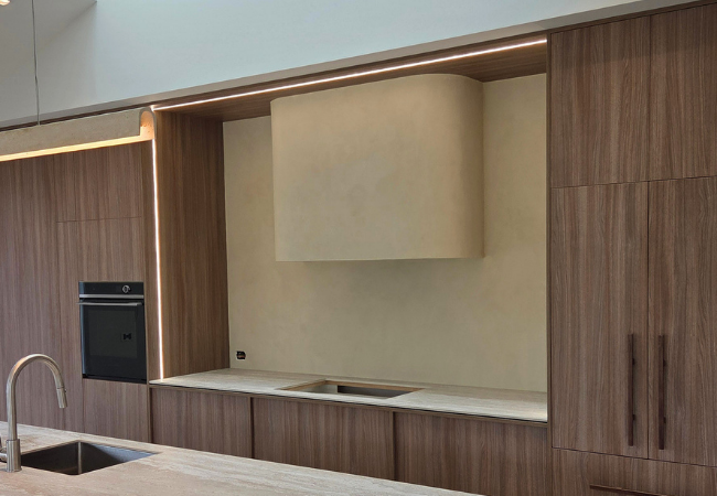 Seamless microcement finish on a bathroom wall
