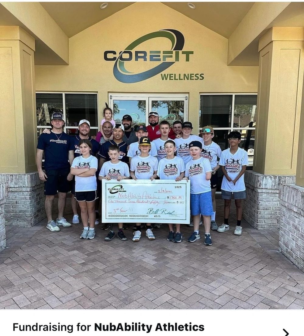 CoreFit team and community members at a fundraiser outside the studio