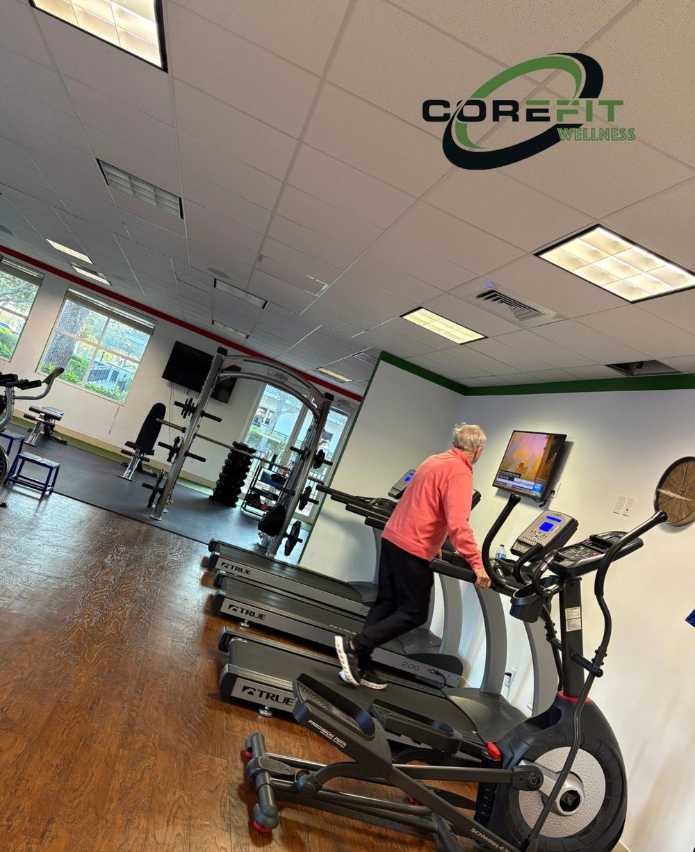A client on the elliptical inside the CoreFit studio