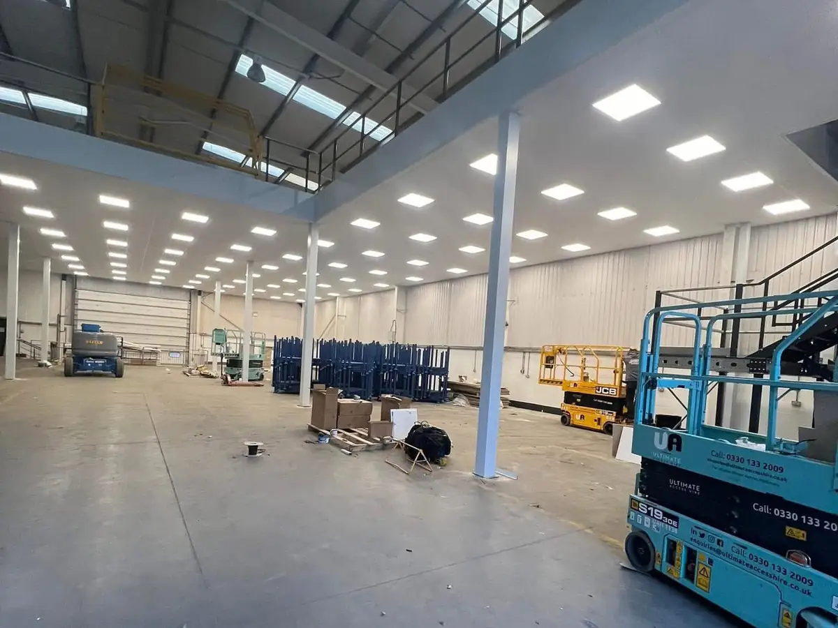 LED panel lighting installed across a warehouse and mezzanine by CT Electrical, Black Country