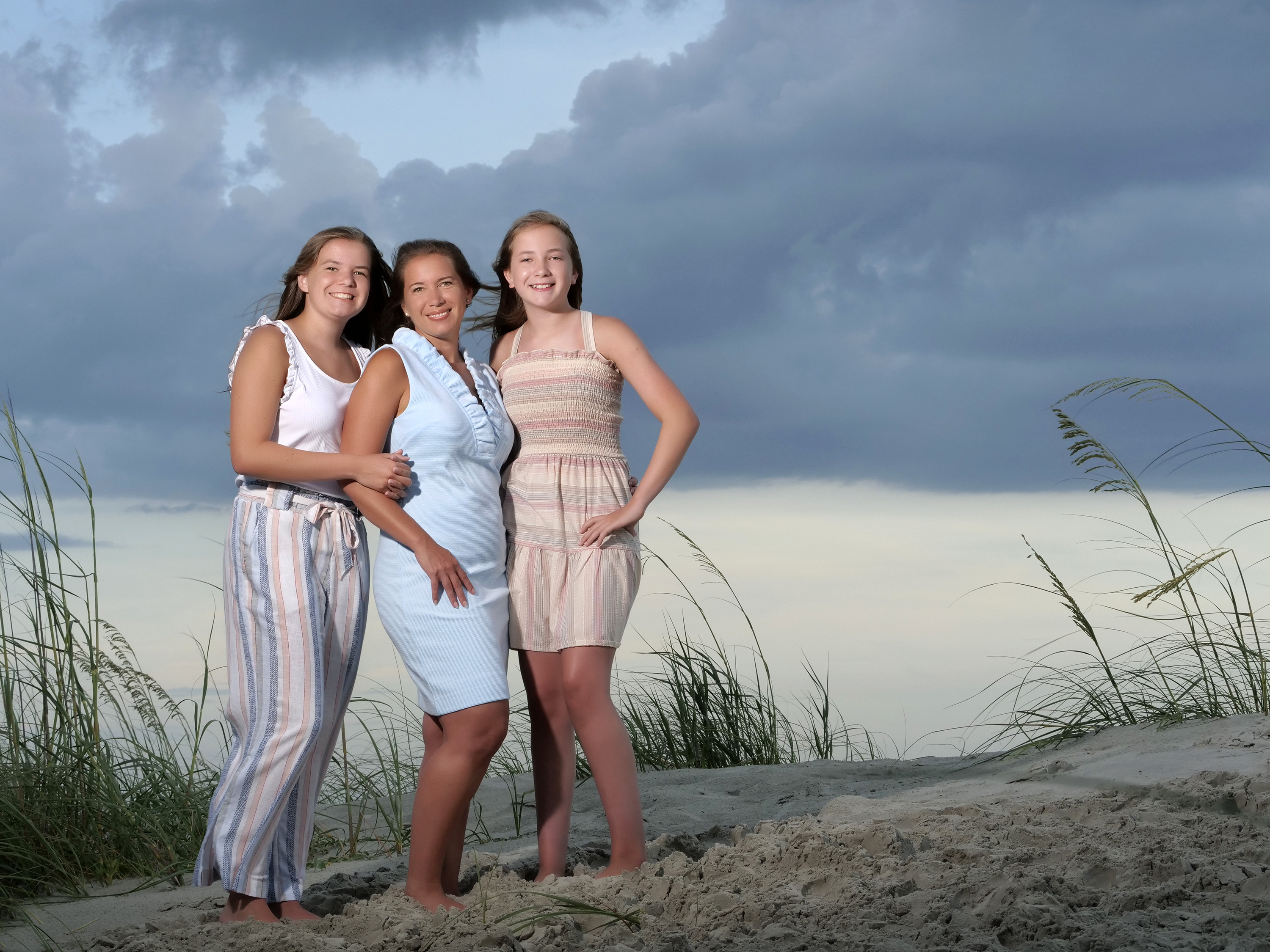 Hilton Head family beach portrait of mother and two teenage daughters in natural coastal setting