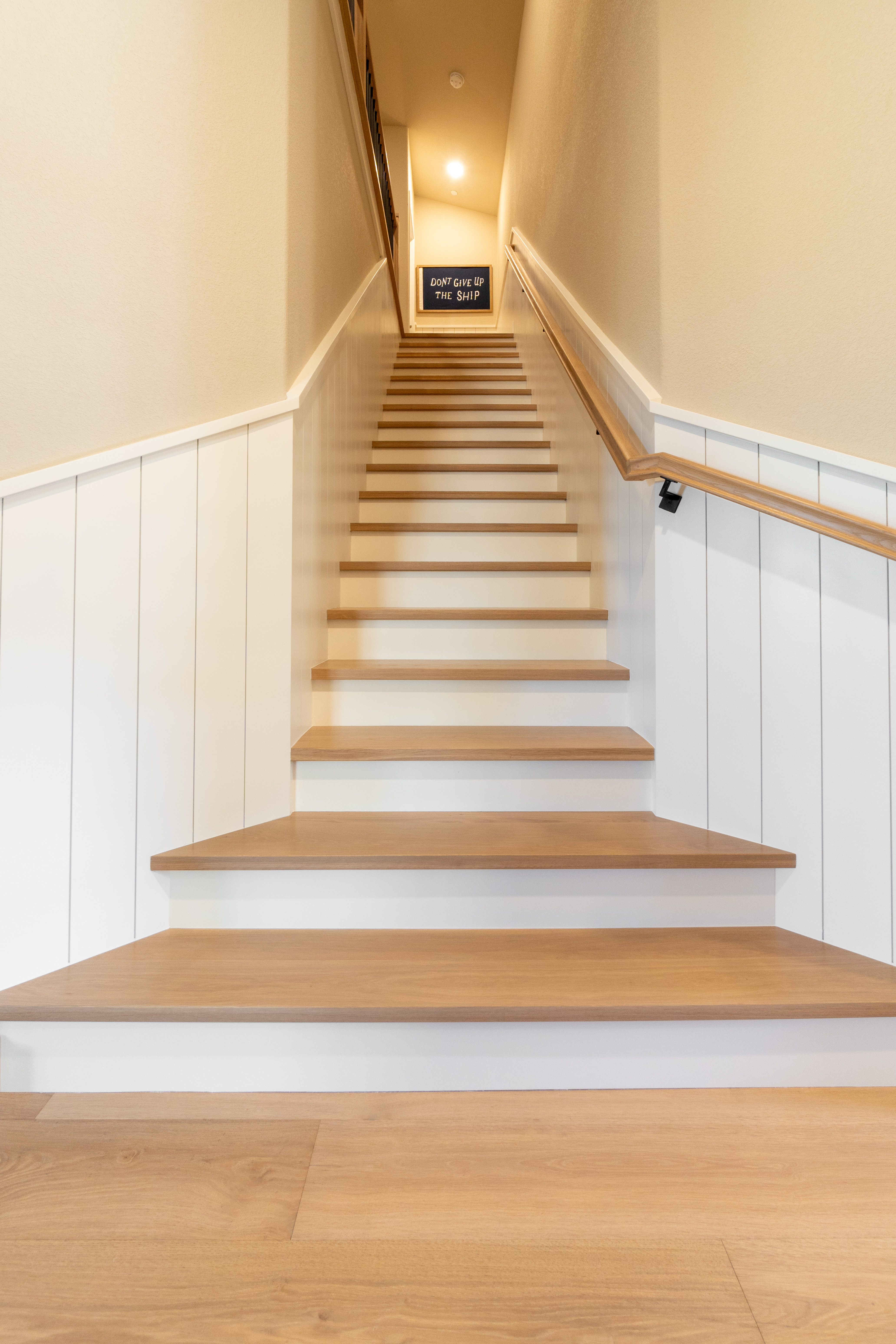 Carpet stairs converted to wood treads with white risers, Roseville CA