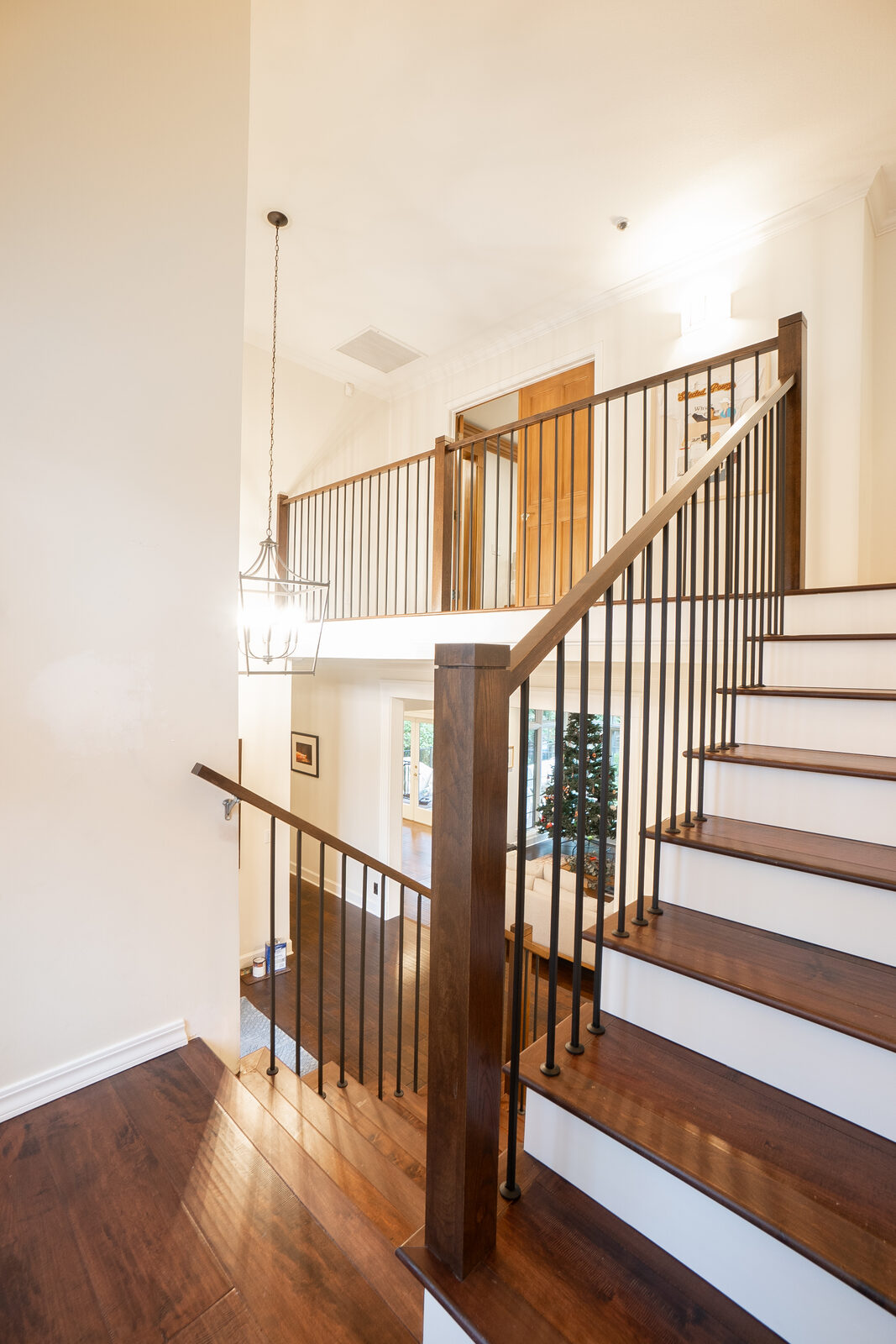 Staircase remodel with hardwood treads and iron balusters, Rocklin CA