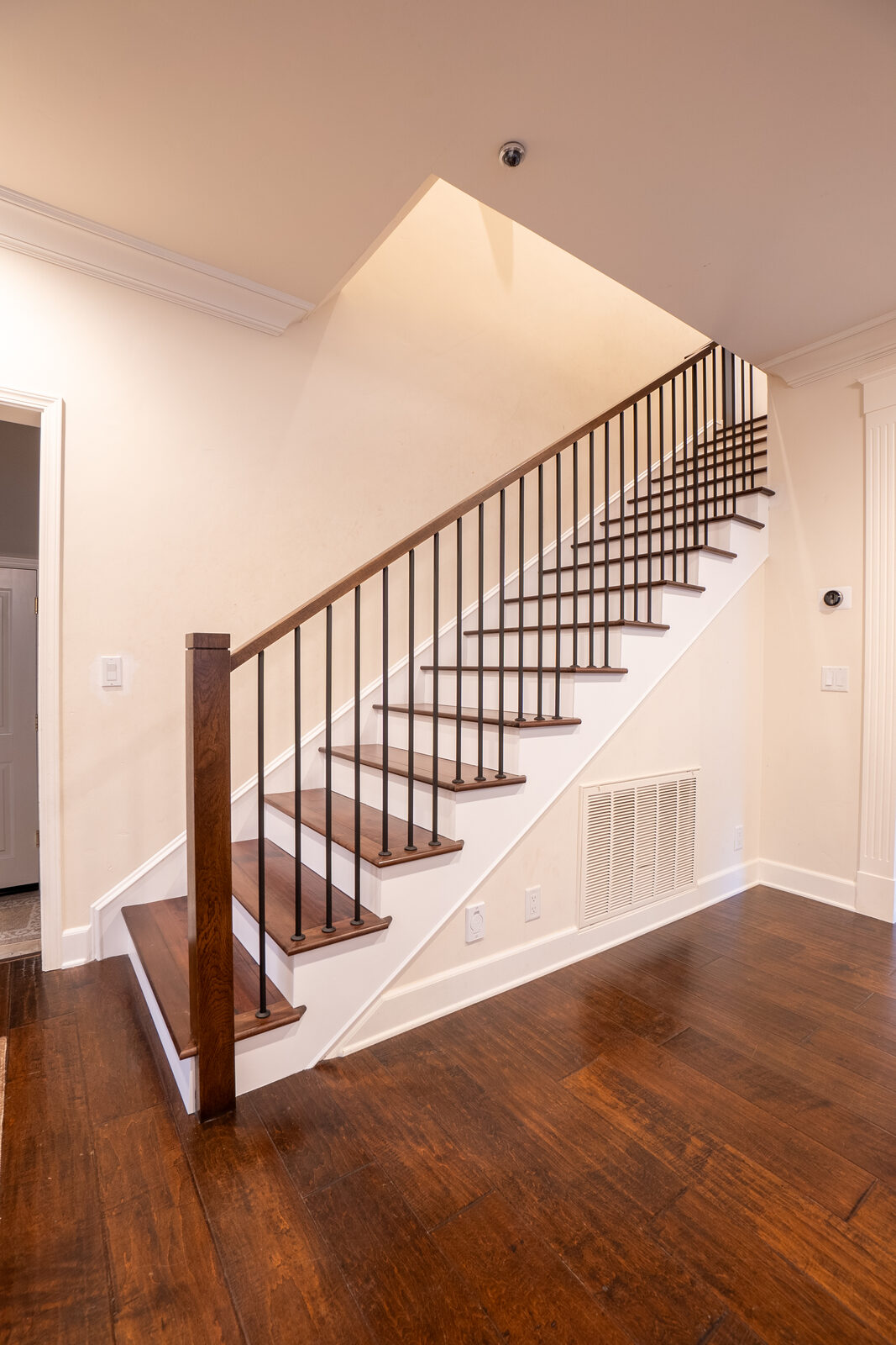 Staircase remodel with iron balusters and hardwood treads, Rocklin CA