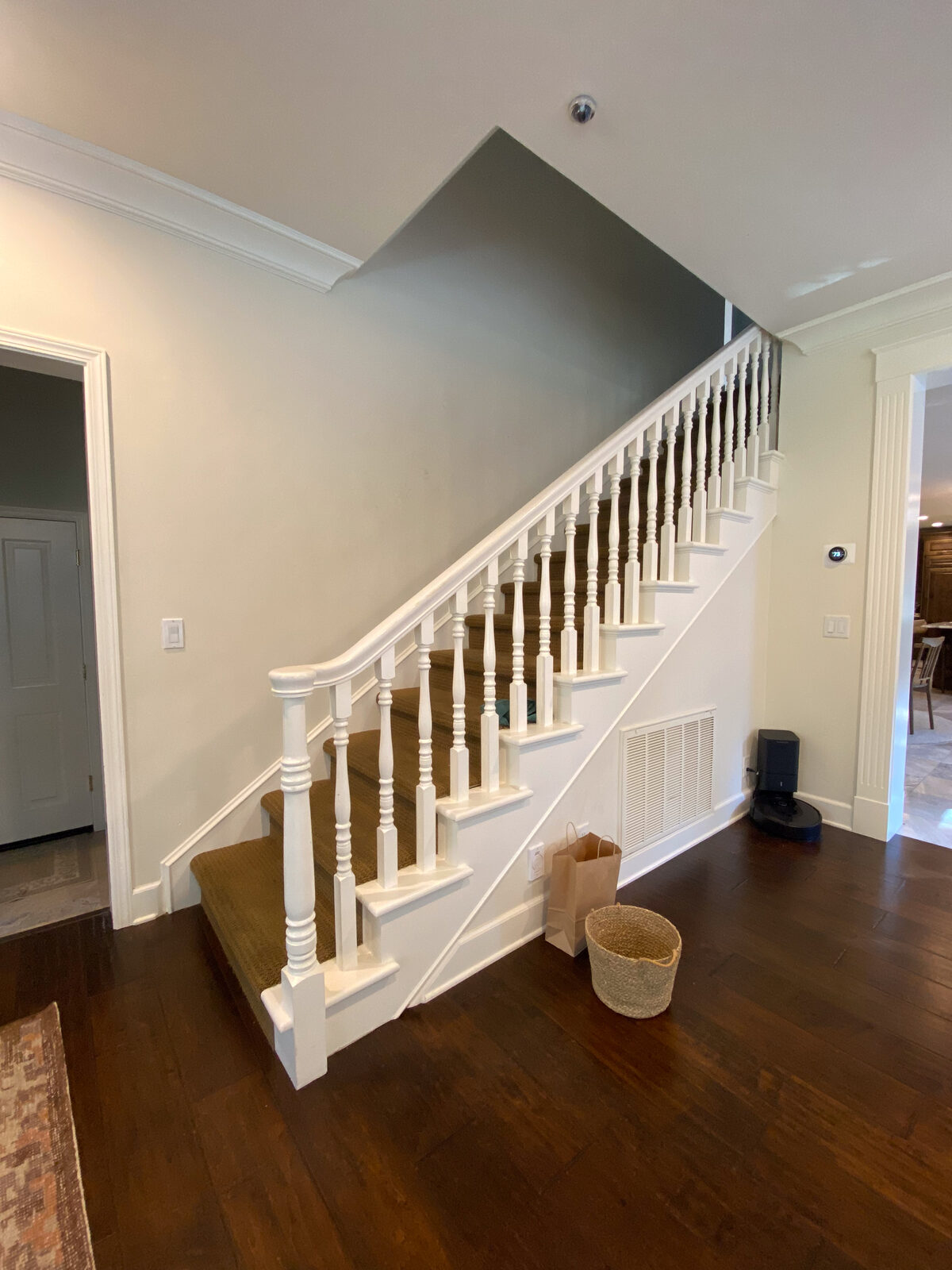 Staircase with white spindles and carpet before remodel, Rocklin CA