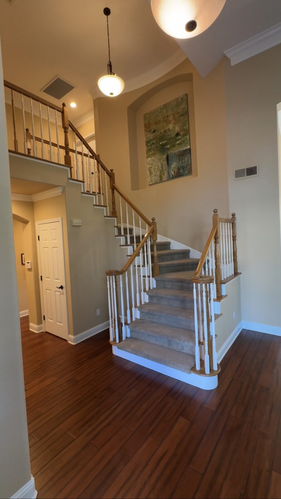 Oak staircase with carpet before remodel, Roseville CA