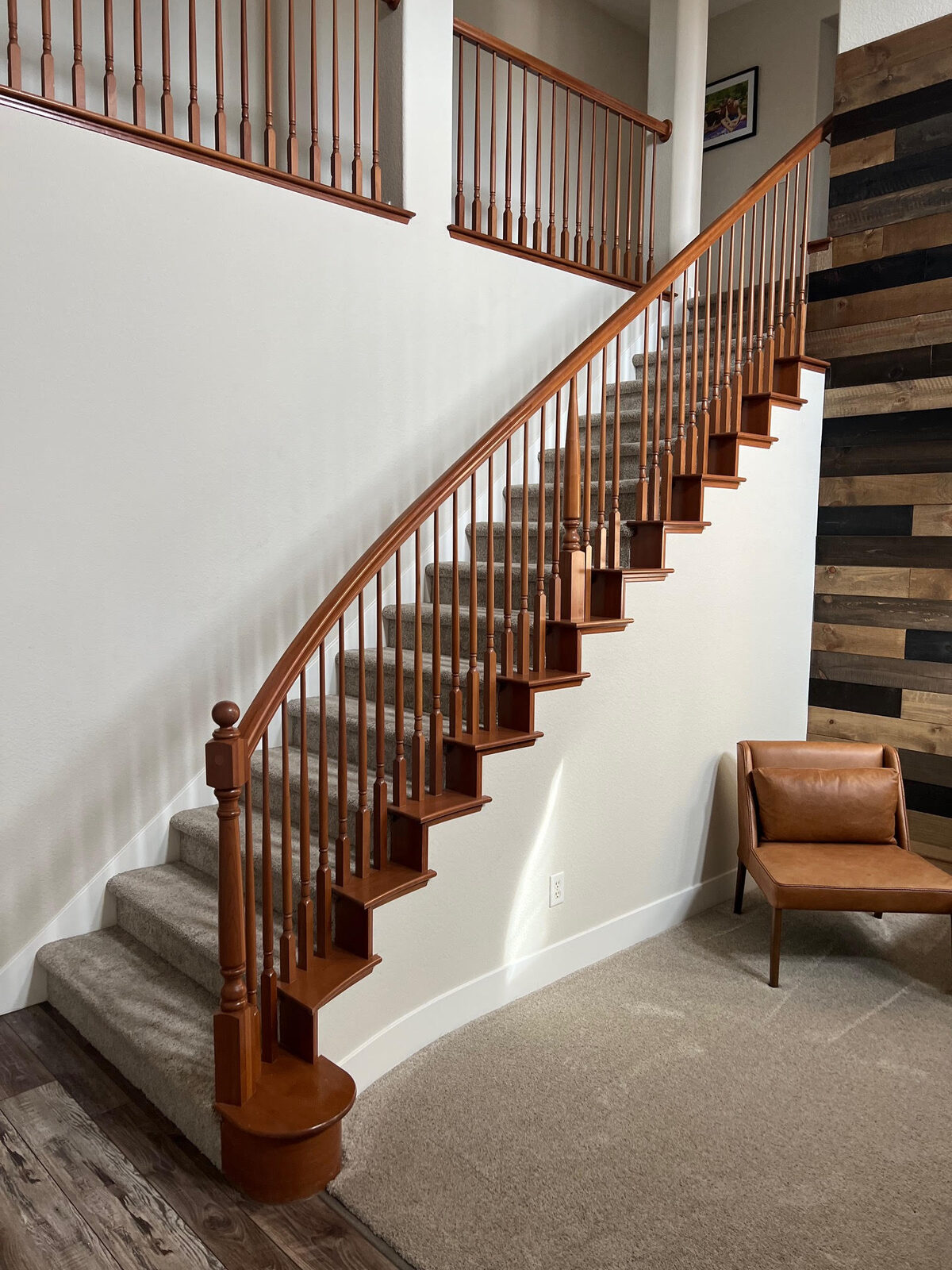 Curved staircase with iron balusters before update, Granite Bay CA