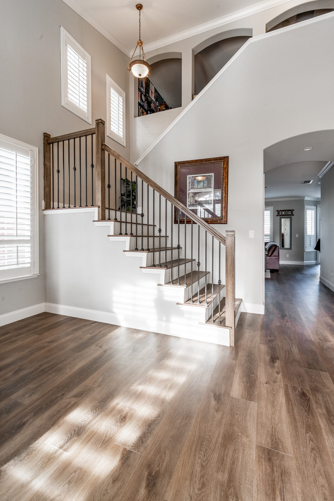Finished staircase with iron balusters and carpet runner, Granite Bay CA