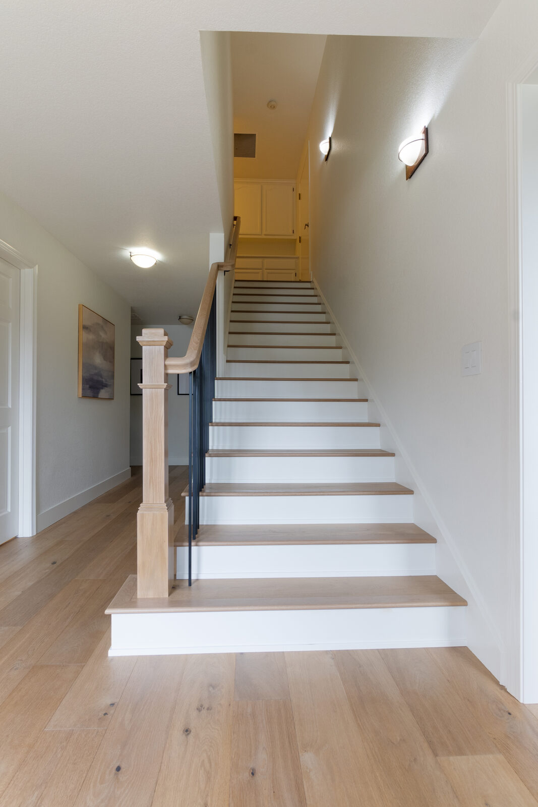 Staircase with hardwood treads and white risers, Lincoln CA