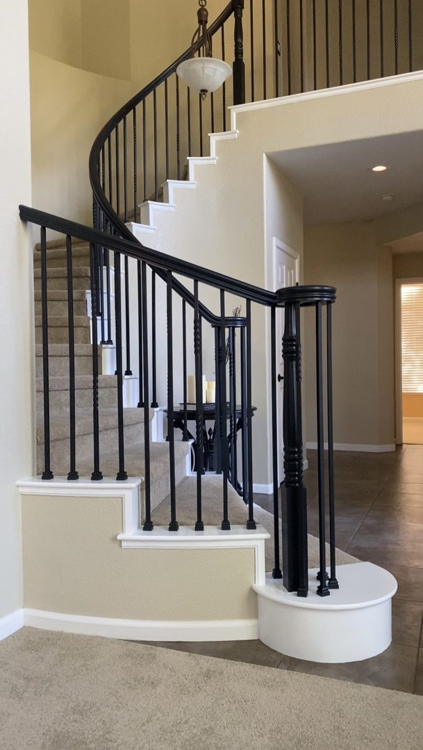 Refinished handrail and posts paired with new wrought-iron balusters — Northern California