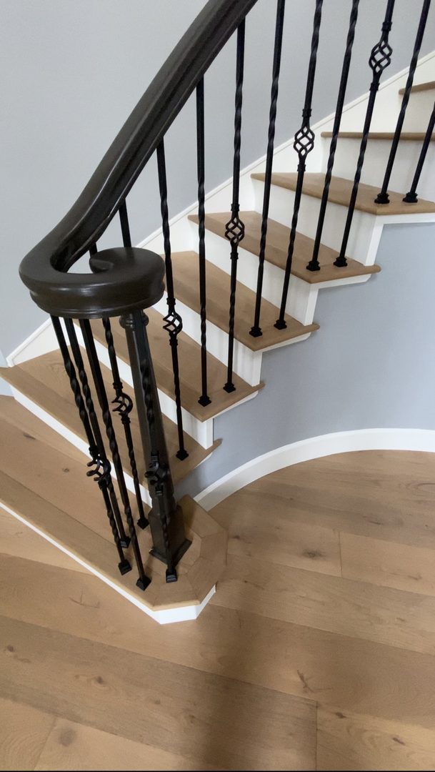 Like-new staircase with refinished railing and new iron balusters — Roseville and Sacramento