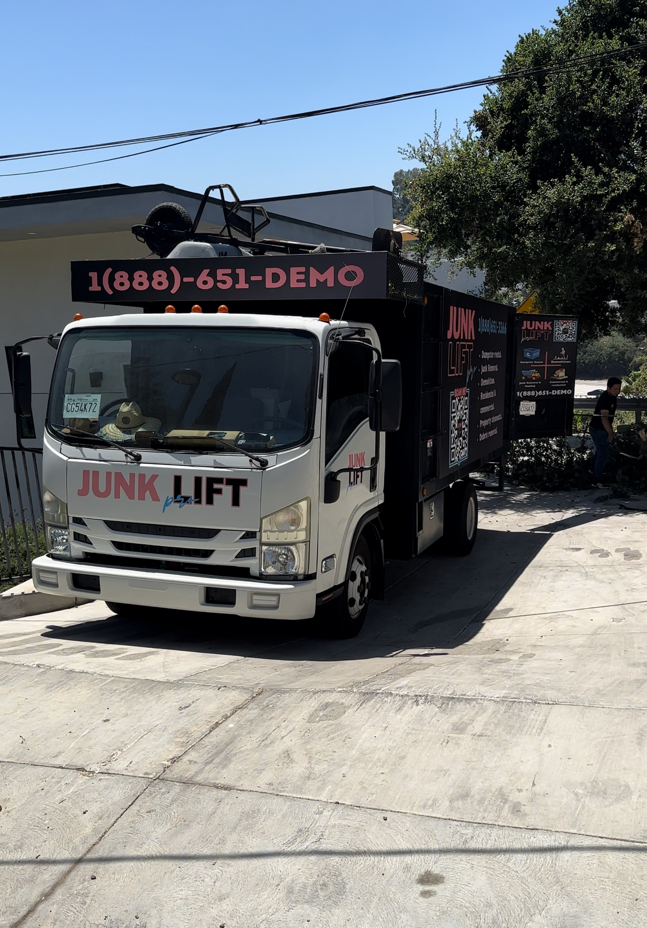 Pool demolition and backfill in progress with protective measures