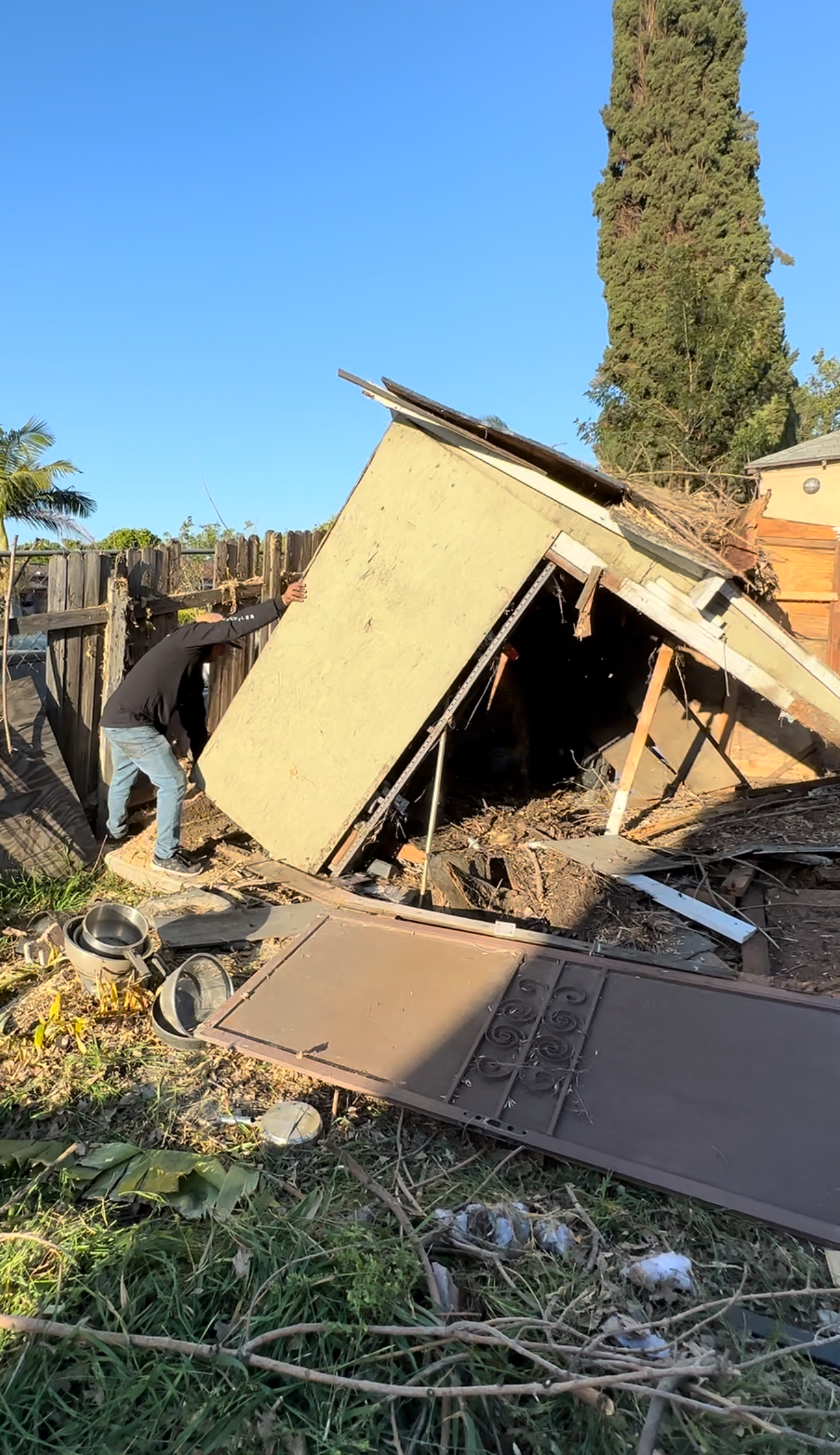 Commercial warehouse dismantling with coordinated crew and safety zones