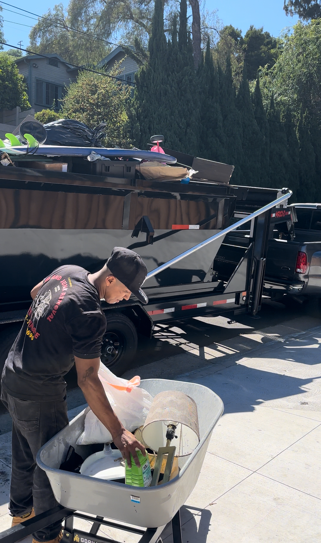 Residential demolition crew working safely at a suburban home