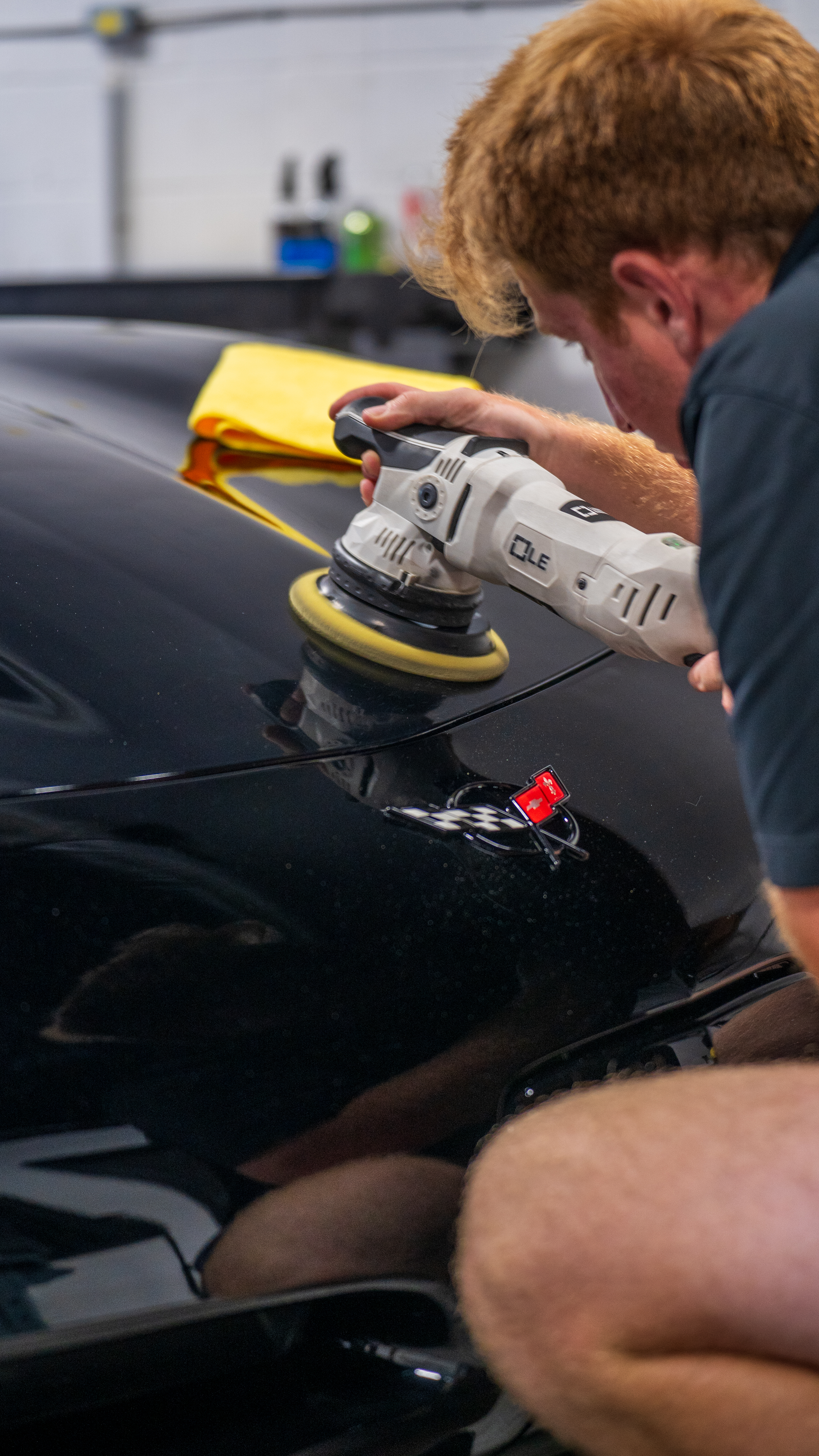 Dual-action polisher correcting black paint