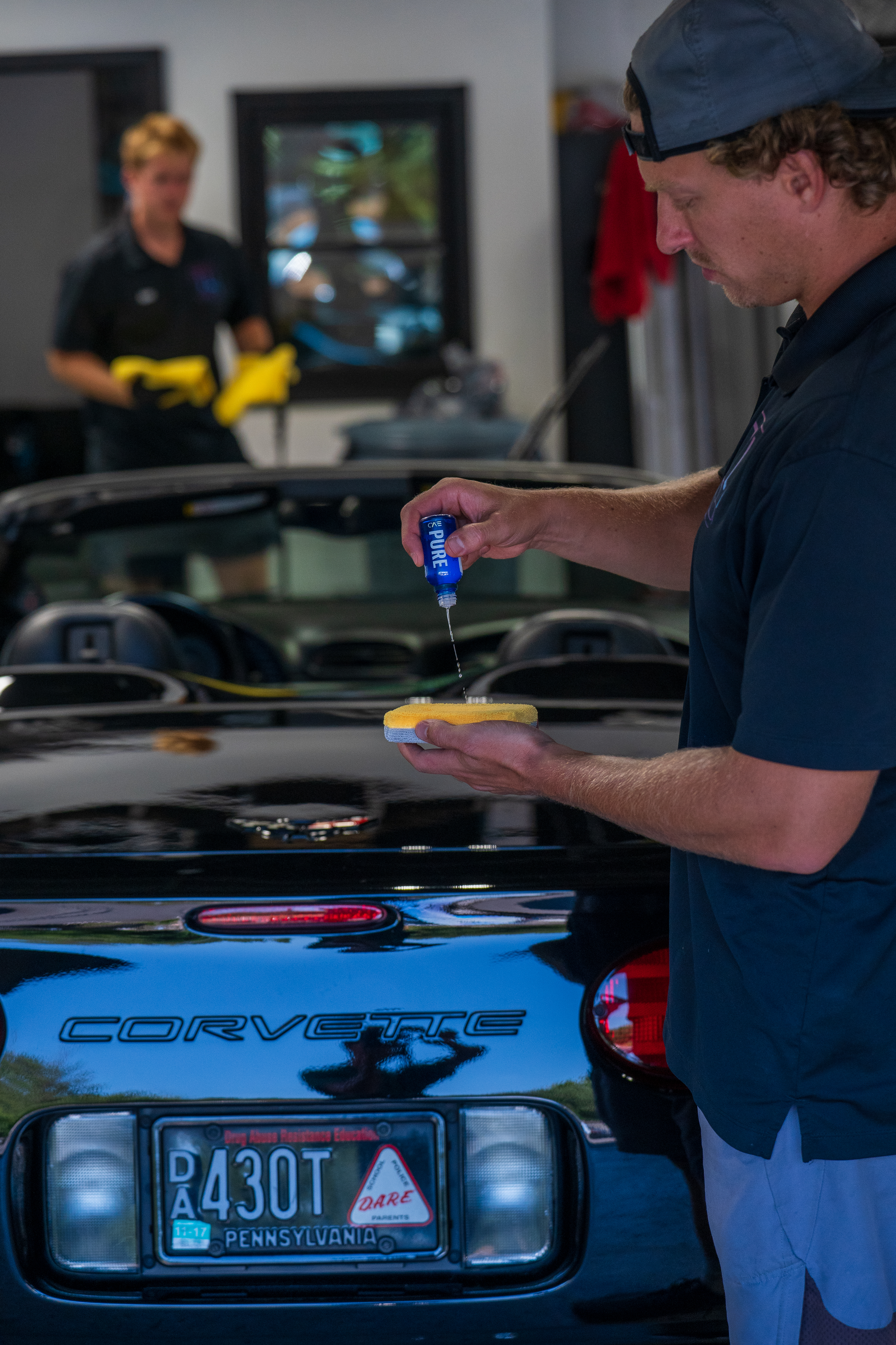 Ceramic coating being applied with an applicator pad