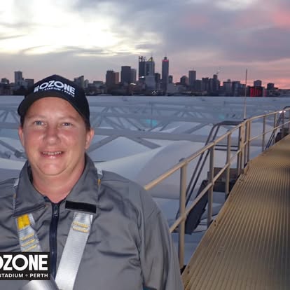 Britt Brennan on Optus Stadium rooftop at sunset