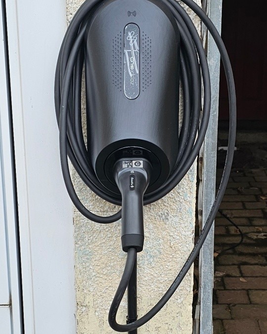 EV charger on a garage wall in North Somerset