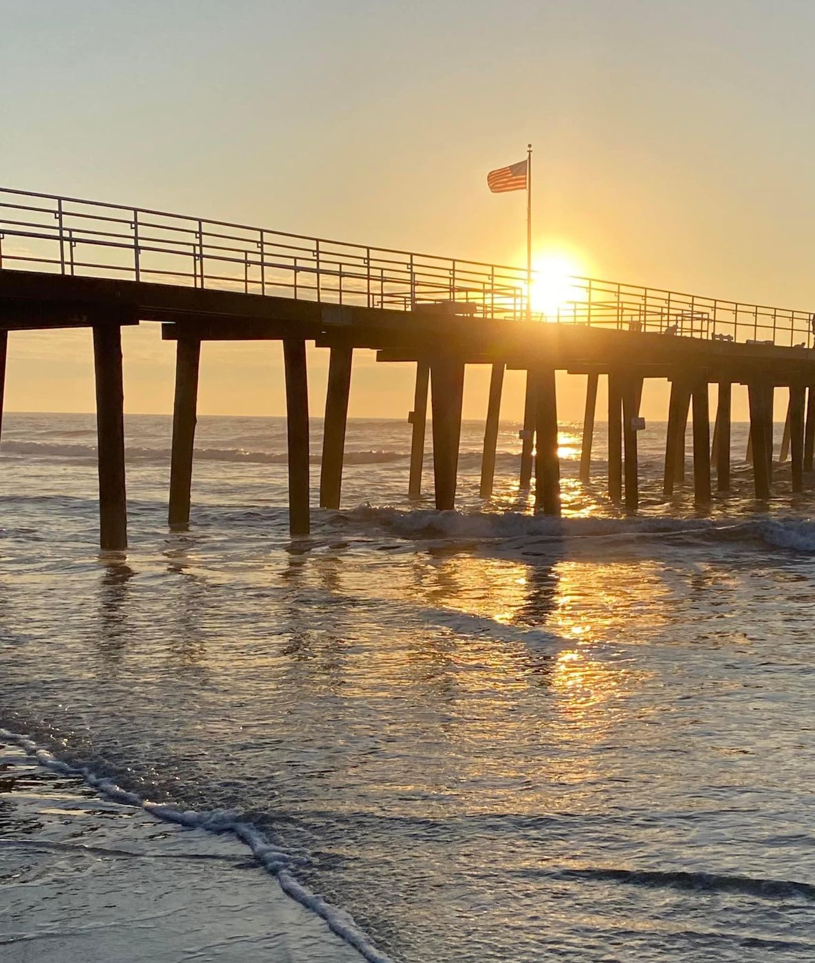 Sunrise behind the fishing pier at the South Jersey Shore